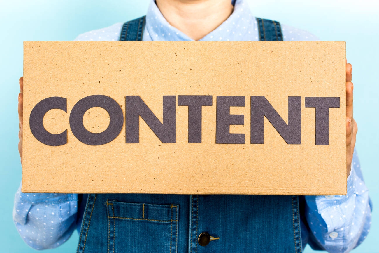 Content Marketing woman-showing-a-box-with-the-word-content-front-view-content-marketing